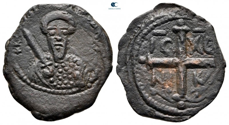 Tancred AD 1101-1103. Antioch
Follis Æ

21 mm, 3,54 g

Bust of Tancred faci...