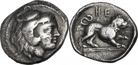 Greek Italy. Southern Lucania, Heraclea. AR Diobol, 432-420 BC. Obv. Head of Herakles right, wearing lion's skin, below chin, Φ; all within dotted bor...