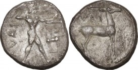 Greek Italy. Bruttium, Kaulonia. AR Stater, 475-425 BC. Obv. KAVΛ. Apollo advancing right, branch in raised right hand; daimon running on extended lef...