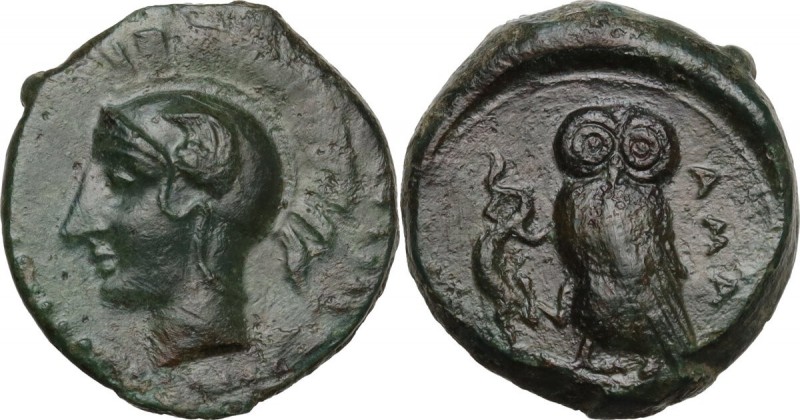 Sicily. Kamarina. AE Tetras, 425-405 BC. Obv. Helmeted head of Athena left. Rev....