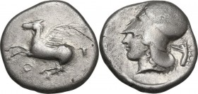 Continental Greece. Corinthia, Corinth. AR Stater, c. 400-375 BC. Obv. Pegasos flying left; below, koppa. Rev. Helmeted head of Athena left; behind ne...
