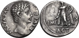 Augustus (27 BC - 14 AD). AR Denarius. Lugdunum mint. Struck 15 BC. Obv. AVGVSTVS DIVI F. Bare head right. Rev. IMP X. Apollo Citharoedus of Actium, s...