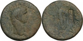 Claudius (41-54). AE Sestertius, struck 42-43 AD, countermarked under Nero. Obv. Laureate head right. Rev. Spes advancing left, holding flower and rai...