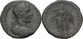 Macrinus (217-218). AE 26 mm. Nicopolis ad Istrum mint, Moesia Inferior. Obv. Laureate and cuirassed bust right. Rev. Nike standing left, leaning on c...