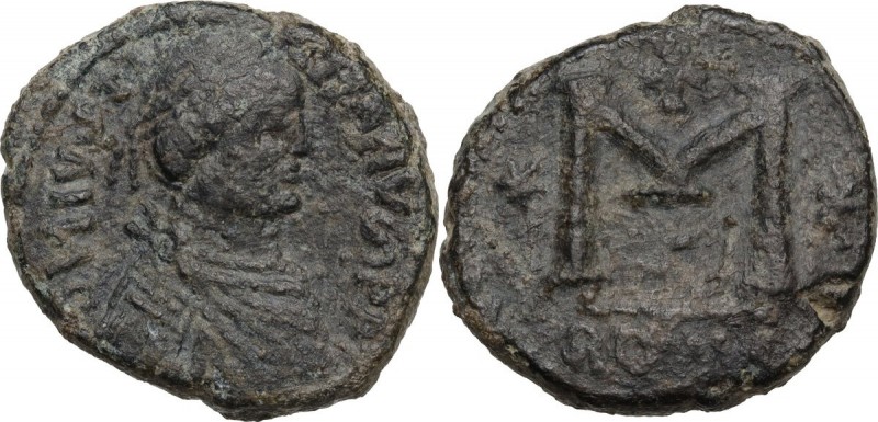 Justinian I (527-565). AE Follis. Rome mint. Obv. Diademed, draped and cuirassed...