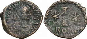 Justinian I (527-565). AE Decanummium, Rome mint. Obv. [D]N IVSTINIANVS PF AVG. Diademed, draped and cuirassed bust right. Rev. Large I between two st...