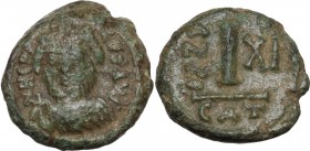 Heraclius (610-641). AE Decanummium. Catania mint. Dated RY 11 (620/1 AD). Obv. DN HERACLIVS P P AVG. Crowned, draped, and cuirassed bust facing, hold...