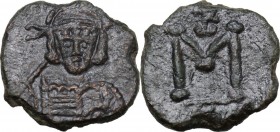 Constantine IV Pogonatus (668-685). AE Follis, Syracuse mint. Obv. No legend. Helmeted and cuirassed bust facing, holding spear and shield. Rev. Large...