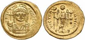 Justynian I Wielki (527-565 n.e.) Solidus, Konstantynopol Konstantynopol - oficyna 10 (I) Awers: Popiersie cesarza w ozdobnym hełmie i zbroi, trzymają...