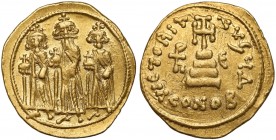 Herakliusz (610-641 n.e.) Solidus, Konstantynopol Awers: Trzech cesarzy w koronach, stojących na wprost, z krzyżami na globach w rękach. Rewers:&nbsp;...