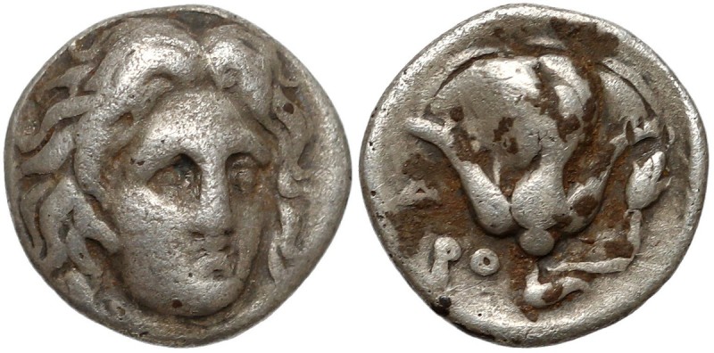 Grecja, Karia, Rodos (304-275 p.n.e.) Hemidrachma Awers: Głowa Heliosa trzy-czwa...
