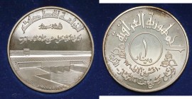 Iraq, 1 Dinar 1977, Opening of Tharthar-Euphrates Canal Srebro .900 Waga: 31,0 g. Moneta w oryginalnym pudełku. 
Grade: UNC/AU 

WORLD COINS - ASIA...