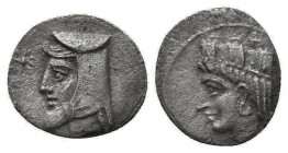 Cilicia, Uncertain. AR Obol, 4th century BC.
Obv. Turreted head of female (Tyche or Tyche-Aphrodite?) left.
Rev. Head of male left, wearing kyrbasia; ...