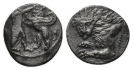 CILICIA, Uncertain. 4th century BC. AR Obol . Forepart of lion left, head facing / Persian king or hero, wearing kidaris and kandys , bow in case on b...