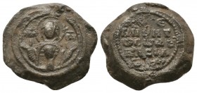 Byzantine lead seal of Basileios officer
(ca 12th cent.)
Obverse: Bust of the Mother of God, facial, nimbate, wearing chiton and maphorion in orans po...