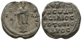 Byzantine lead seal of Basileios protoproedros
(ca 12th cent.)
Obverse: Saint Basileios (the Great) standing, facial, nimbate, wearing prelate's garme...