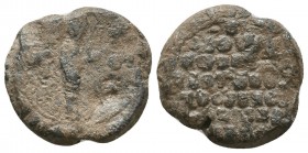 Byzantine lead seal of N. officer 
(11th cent.)
Obverse: Mother of God standing in profile to right in praying posture before manus Dei (blessing hand...