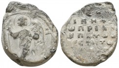 Byzantine lead seal of 
Michael patrikios, hypatos and vestis
(11th cent.)
Obverse: Archangel Michael standing, facial, nimbate, with open wings, wear...