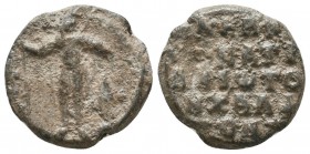Byzantine lead seal of Ignatios Chaldos spatharios (?)
(11th cent.)
Obverse: Uncertain military saint standing facing, wearing military dress, holding...