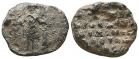 Byzantine lead seal of N. doux of Mesopotamia
(ca 11th cent.)


Obverse: Saint George standing facing, wearing military dress, holding spear in right ...