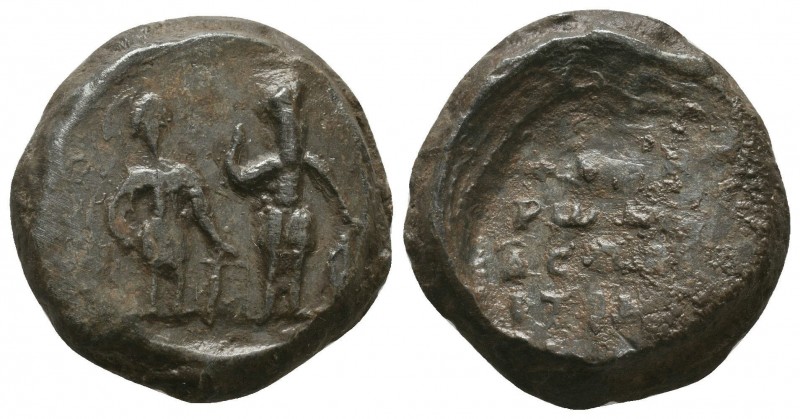 661. Byzantine lead seal of N. protospatharios
(ca 11th cent.)
 

Obverse: Two u...