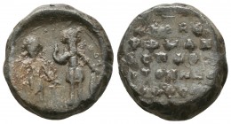 663. Byzantine lead seal of Romanos 
protospatharios and vestis
(ca 11th cent.)

Obverse: Two military saints, the one on right saint Theodoros, stand...