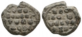 Byzantine lead seal of Basileios vestarches
(ca 12th cent.)

Obverse: Inscription in 4 lines between decorative patterns, +ΚΕ/RΟΗΘΕΙ/ΤΩCΩ/ΔΟVΛ, = Κύρι...