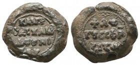 Byzantine lead seal of Chamdounios
(ca 11th cent.)

Obverse: Inscription in 3 lines, + ΛΟ/ΓΟΥCCΦΡ(Α)/ΓΙΖΩ = Λόγους σφραγίζω (I seal the words), dotted...