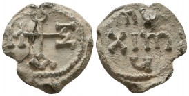 A nice bilingual byzantine lead seal 
of Maximus officer (6th cent.)
Obverse: Cruciform monogram, resolved with certainty as ΜΑΞΙΜΟΥ (Of Maximus, the ...