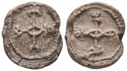 Byzantine lead seal of Eustathius officer
 (6th/7th cent.)
 
Obverse: Cruciform monogram, resolved with certainty as ΘΕΟΤΟΚΕ ΒΟΗΘΕΙ (Mother of God, he...