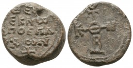 Byzantine lead seal of Theoteknos honorary eparch
 (end of 7th cent.)

Obverse: Cruciform monogram, resolved with certainty as ΘΕΟΤΟΚΕ ΒΟΗΘΕΙ (Mother ...