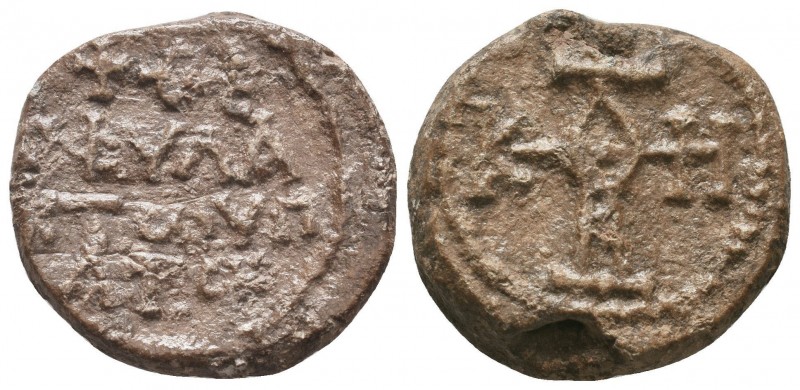 Byzantine lead seal of Theophylaktos hypatos
 (end of 7th cent.)
Obverse: Crucif...