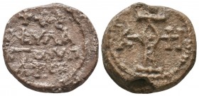 Byzantine lead seal of Theophylaktos hypatos
 (end of 7th cent.)
Obverse: Cruciform invocative monogram, resolved with certainty as ΘΕΟΤΟΚΕ ΒΟΗΘΕΙ (Mo...