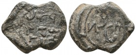 Bilingual byzantine lead seal of John officer
 (6th cent.)
Obverse: Cruciform monogram, resolved with certainty as ΙΩΑΝΝΟΥ (of John, owner of the seal...