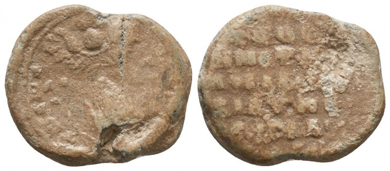 Byzantine lead seal of uncertain officer
 (ca 11th cent.)
 
Obverse: Uncertain d...