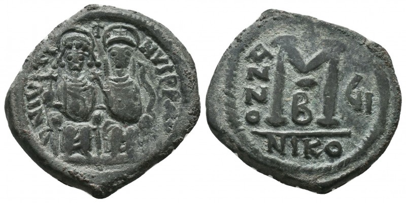 Justin II , with Sophia (565-578 AD). AE Follis 

Condition: Very Fine


Weight:...