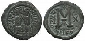 Justin II , with Sophia (565-578 AD). AE Follis 

Condition: Very Fine


Weight: 16,9 gram
Diameter: 28,7 mm