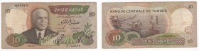 Tunisia - Repubblica Tunisina (dal 1956) 10 dinari tipo "Bourguiba"- emissione del 1986 - N°serie D/33 123479 - P# 84

BB

 Worldwide shipping