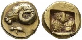 IONIA. Phokaia. Circa 625/0-522 BC. 1/24 Stater (Electrum, 6 mm, 0.64 g). Head of a ram to left; below, small seal to left. Rev. Quadripartite incuse ...