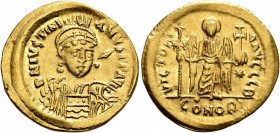Justinian I, 527-565. Solidus (Gold, 21 mm, 4.48 g, 5 h), Constantinopolis, 527-538. D N IVSTINIANVS P P AVG Helmeted, diademed and cuirassed bust of ...