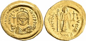Justinian I, 527-565. Solidus (Gold, 23 mm, 4.52 g, 7 h), Constantinopolis, 545-565. D N IVSTINIANVS P P AVI Helmeted and cuirassed bust of Justinian ...