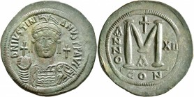 Justinian I, 527-565. Follis (Bronze, 42 mm, 23.25 g, 7 h), Constantinopolis, RY 12 = 538/9. D N IVSTINIANVS P P AVI Helmeted and cuirassed bust of Ju...