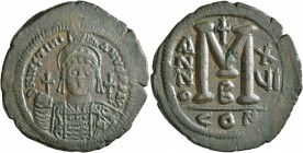 Justinian I, 527-565. Follis (Bronze, 37 mm, 22.08 g, 7 h), Constantinopolis, RY 16 = 542/3. D N IVSTINIANVS P P AVI Helmeted and cuirassed bust of Ju...