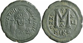 Justinian I, 527-565. Follis (Bronze, 38 mm, 24.00 g, 6 h), Nicomedia, RY 16 = 541/2. D N IVSTINIANVS P P AVI Helmeted and cuirassed bust of Justinian...
