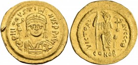 Justin II, 565-578. Solidus (Gold, 21 mm, 4.38 g, 7 h), Constantinopolis, 566/7-578. D N IVSTINVS P P AVI Helmeted and cuirassed bust of Justin II fac...