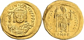 Justin II, 565-578. Solidus (Gold, 21 mm, 4.42 g, 5 h), Constantinopolis, 566/7-578. D N IVSTINVS P P AVI Helmeted and cuirassed bust of Justin II fac...
