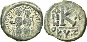 Justin II, with Sophia, 565-578. Half Follis (Bronze, 24 mm, 7.00 g, 6 h), Cyzicus, RY 10 = 574/5. D N IVSTINVS P P AVG Justin II, holding globus cruc...