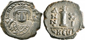 Maurice Tiberius, 582-602. Dekanummium (Bronze, 18 mm, 3.07 g, 6 h), Theoupolis (Antiochia), RY 11 = 592/3. δ N mA•CN•P•AЧ Crowned facing bust of Maur...