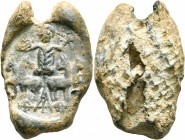 ROMAN. Seal (Lead, 18x27 mm, 11.16 g), circa 3rd-4th centuries. Charioteer in spread quadriga, holding wreath in his raised left hand and an uncertain...