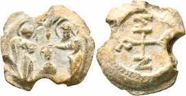 Damianos, 6th-7th centuries. Seal (Lead, 22 mm, 9.10 g, 12 h). The Baptism of Christ: Christ, wearing nimbus cruciger, kneeling in center, being bapti...